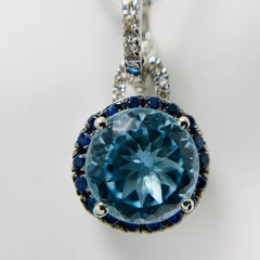 Woman's Blue Topaz and Diamond Halo Pendant Necklace 14k Yellow Gold - ONeil's Jewelry 