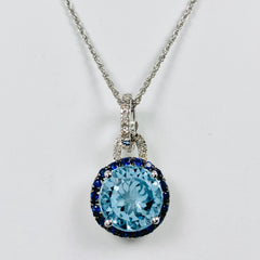 Woman's Blue Topaz and Diamond Halo Pendant Necklace 14k Yellow Gold - ONeil's Jewelry 