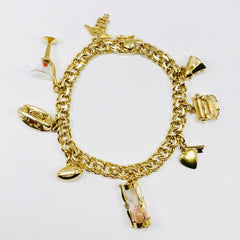Vintage One-of-a-Kind Heavy Charm Bracelet 14k Yellow Gold - ONeil's Jewelry 
