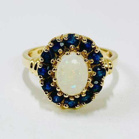 Vintage Woman's Opal and Blue Topaz Halo Ring 10k Yellow Gold - ONeil's Jewelry 